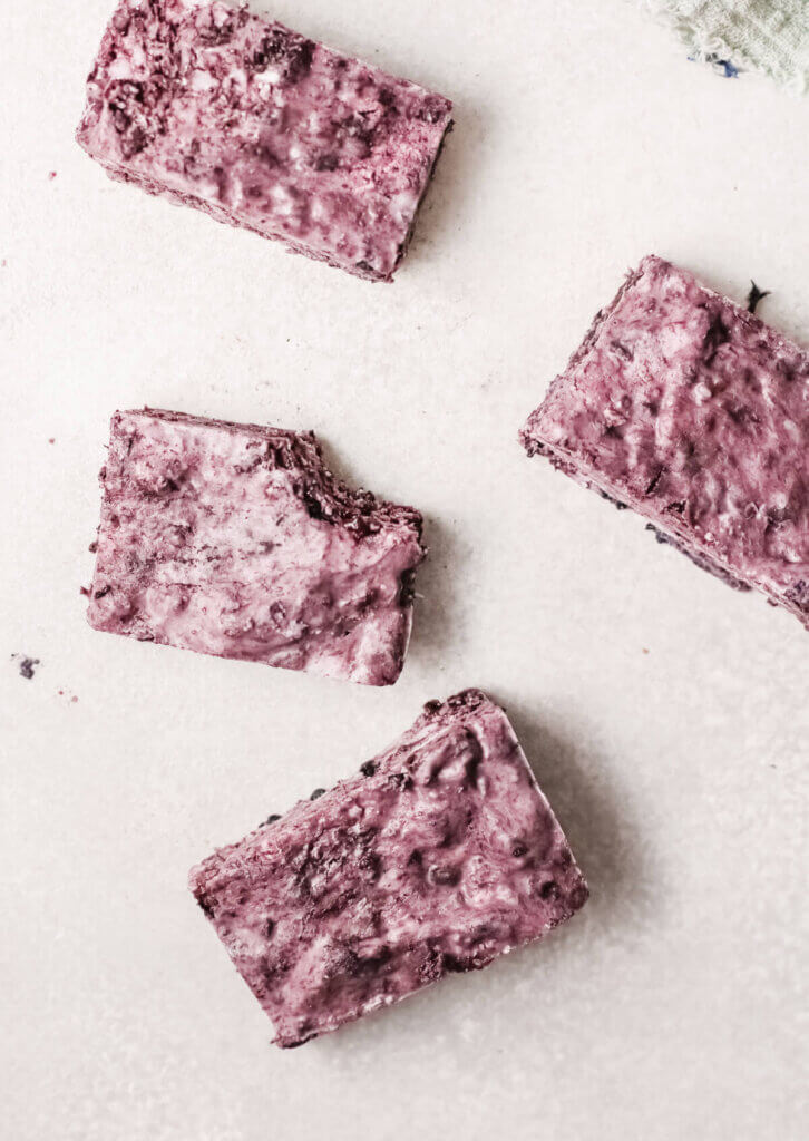 Top view of blackberry bliss bombs with bite taken out of one