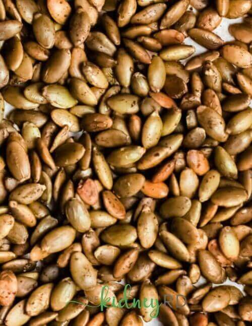 Close up view of keto kidney sweet ginger roasted pumpkin seeds 