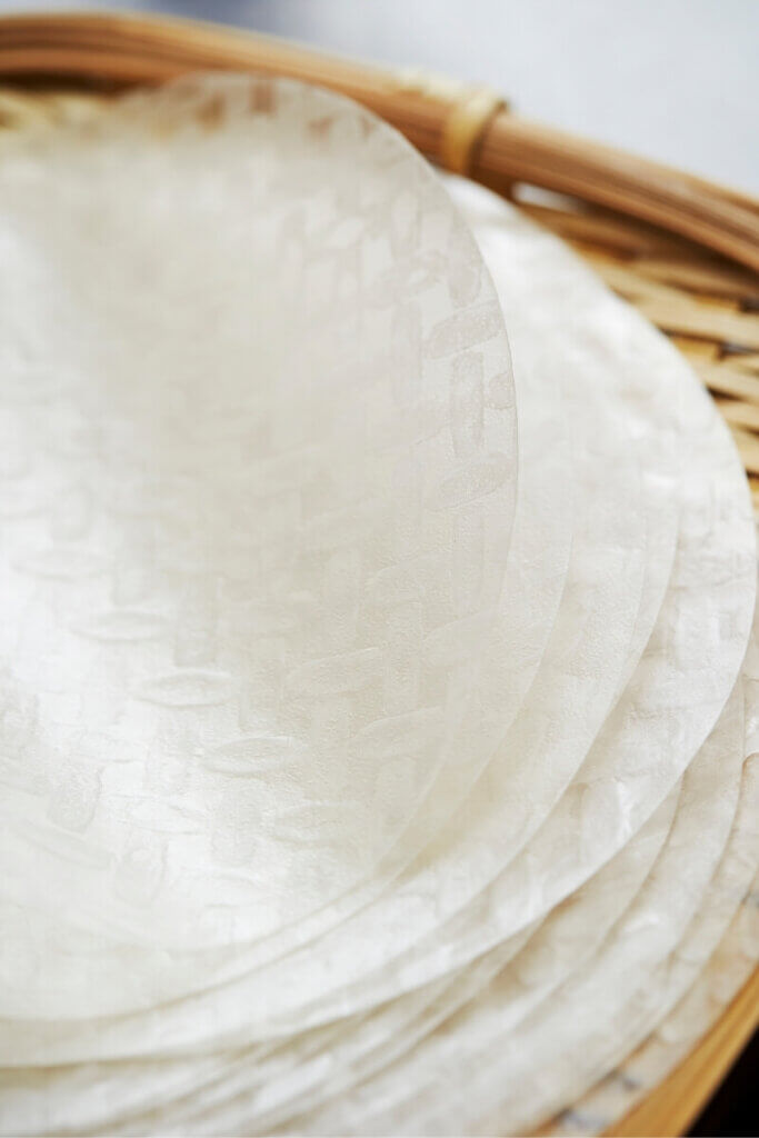 Stack of rice paper sheets in a basket