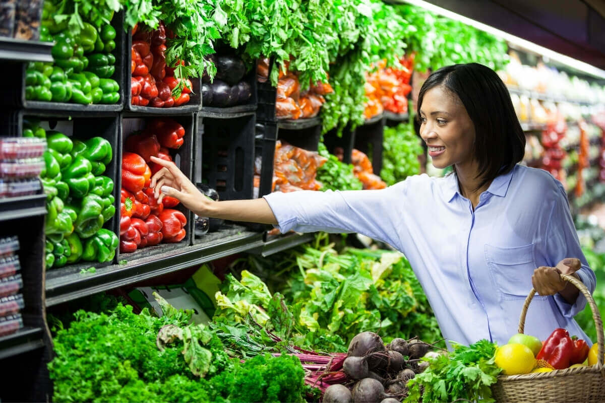 Woman Picking Out Vegetables