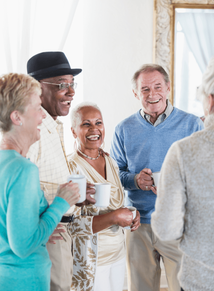 Interracial Friends sharing snacks that are kidney diet healthy