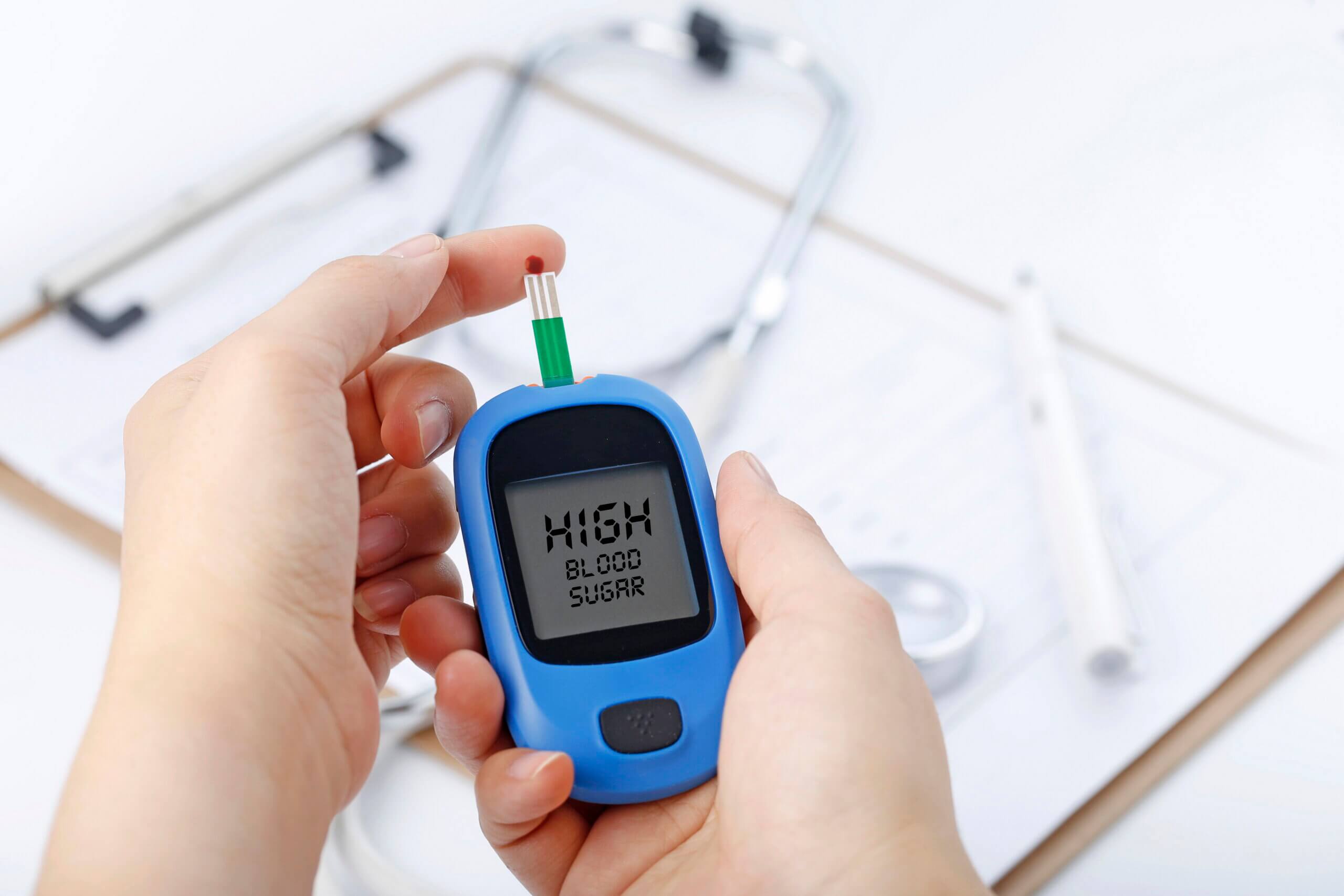 Blood Glucose Meter Measuring High Blood Sugar Showing Importance of Kidney and Diabetes Diet