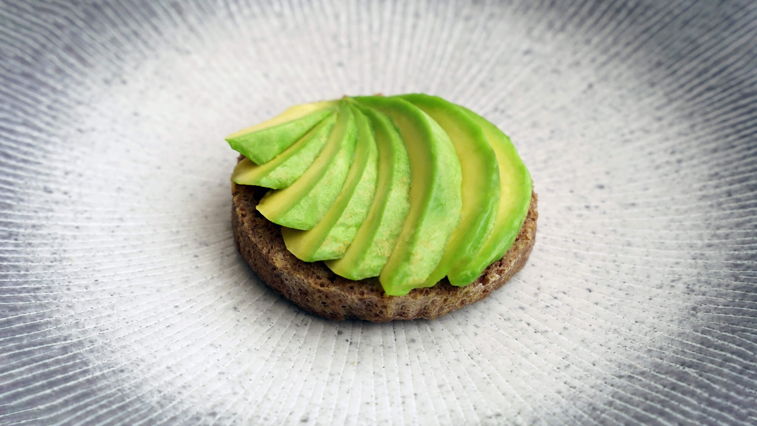 Avocado Toast featuring slices of avocado on KNI's 90-Second Keto Bread