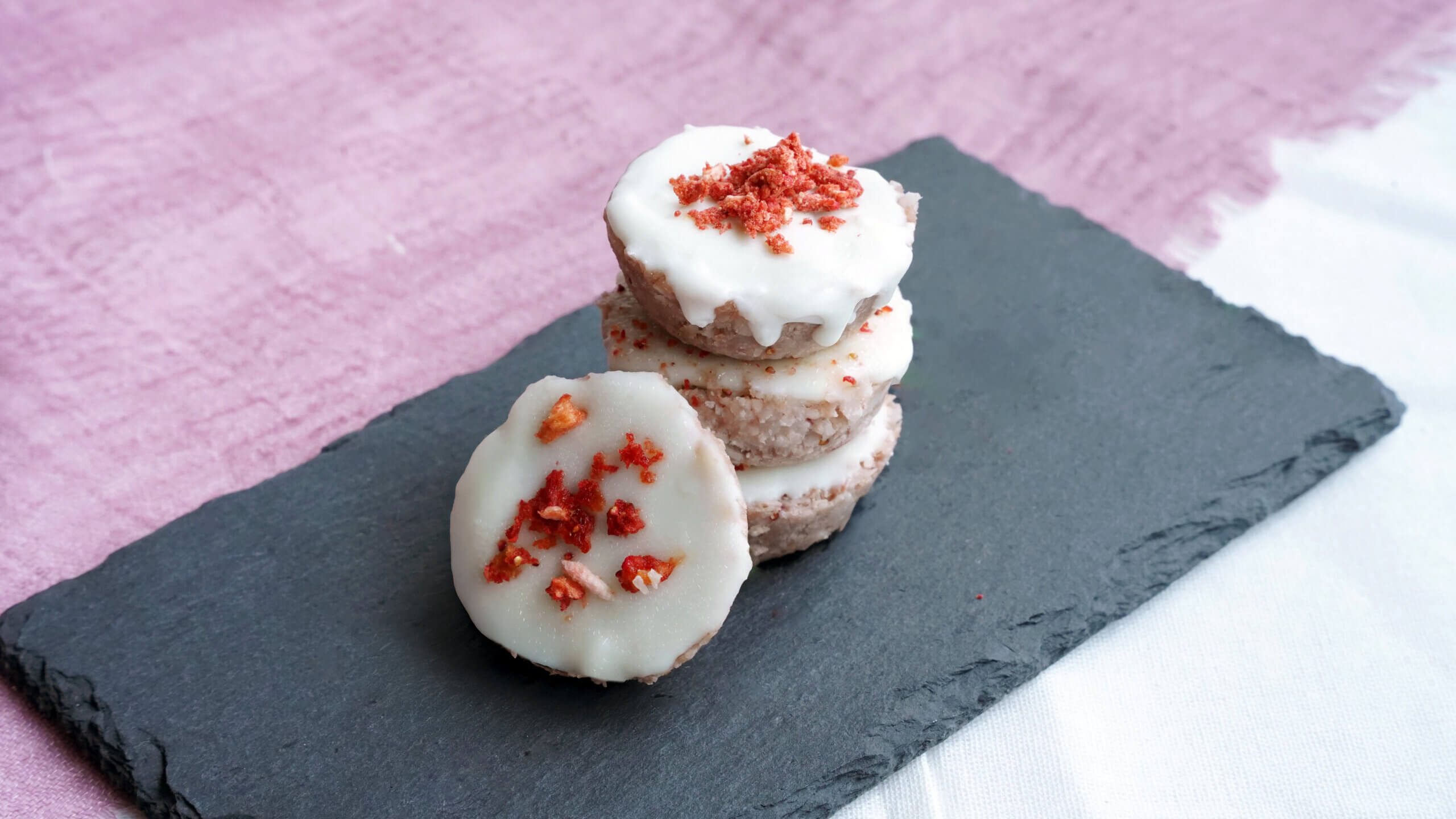 Strawberry Coconut No Bake Energy Bites Stacked