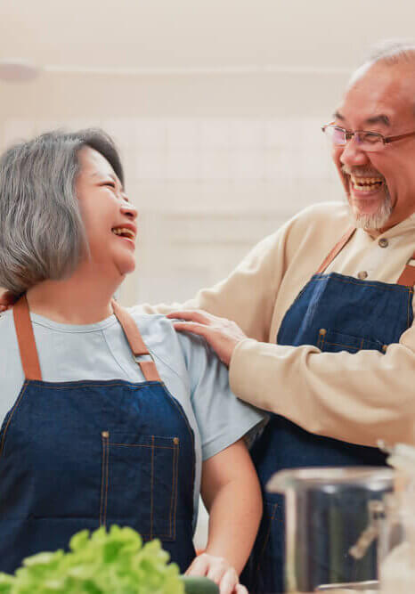 Portrait,of,mature,man,and,woman,pensioner,preparing,vegetable,in